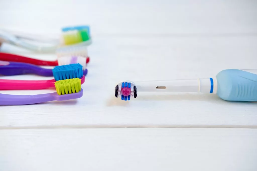 manual toothbrushes and electric toothbrush.