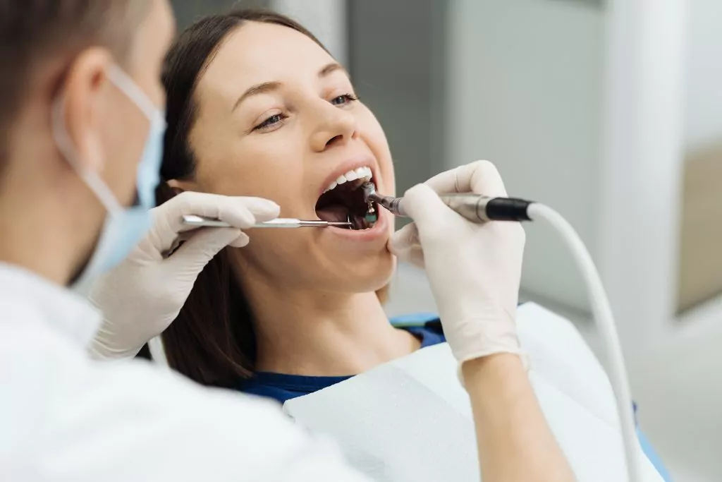 Oral hygiene, dentist doing Scaling and brushing procedure